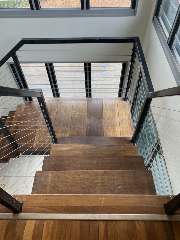 Timber staircase and landing from above, after polishing.